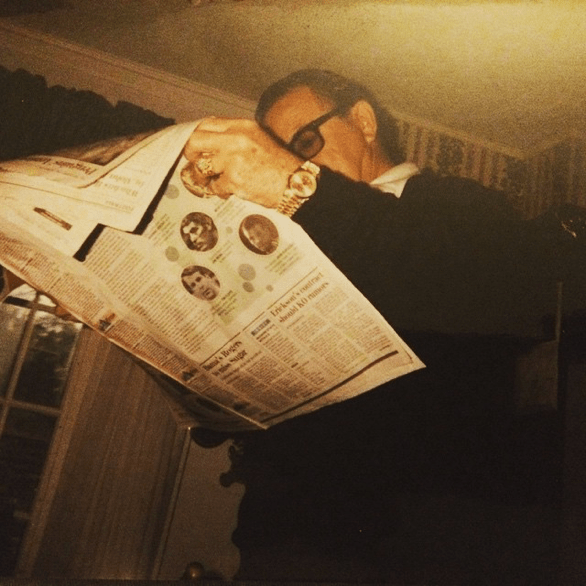 Papa reading the papar...circa eight year old me